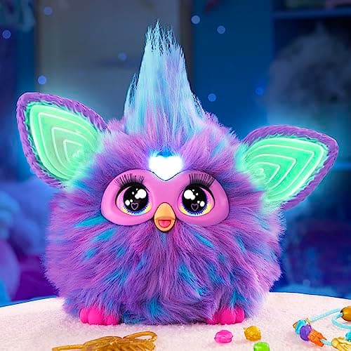 The 2023 Furby glowing with colour-changing light-up ears in a darkened room