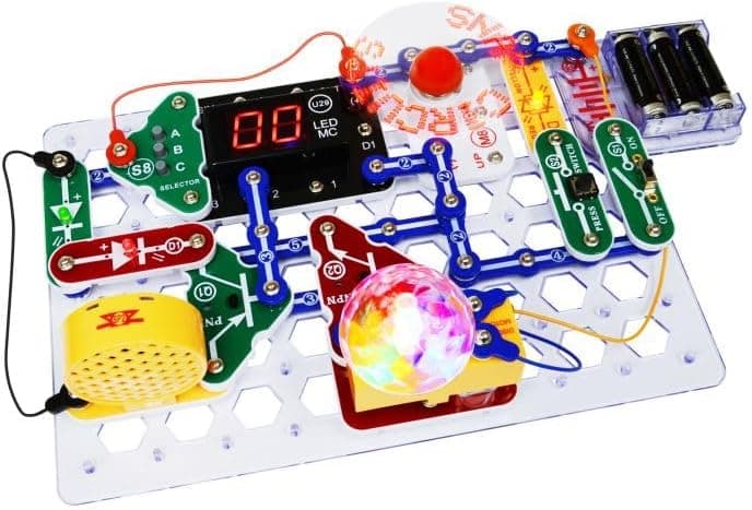 Completed Snap Circuits Arcade game with lit LED display and spinning Word Fan built on the grid baseplate