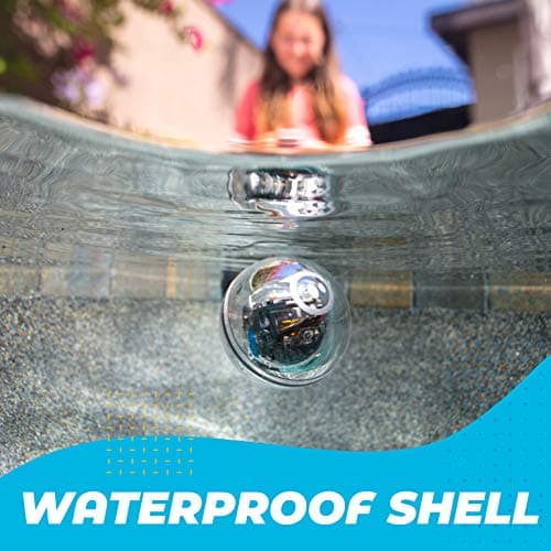 Sphero BOLT under water in a pool, manufacturer overlay reading waterproof shell