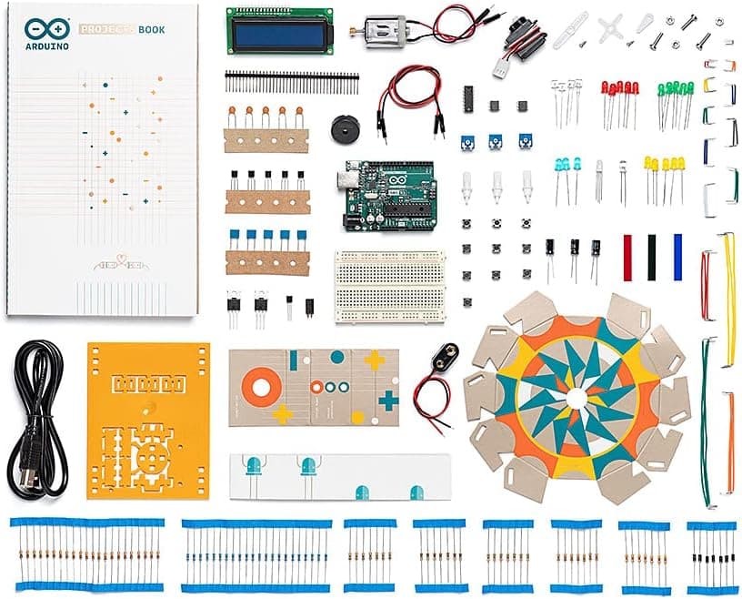 Official Arduino Starter Kit box and components including the Uno board, sensors, LEDs and project book