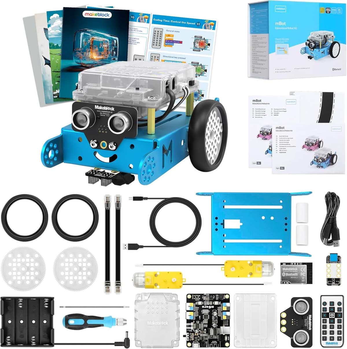 Makeblock Scratch Coding Box bundle: mBot car, lesson cards and project sheets on a yellow desk