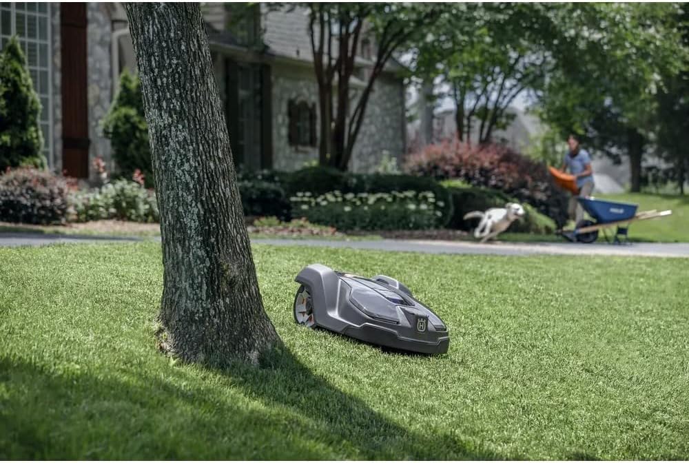 Husqvarna Automower 430XH GPS robot lawnmower on UK lawn